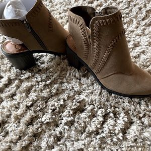 Bootie boots. New in a box and never worn.